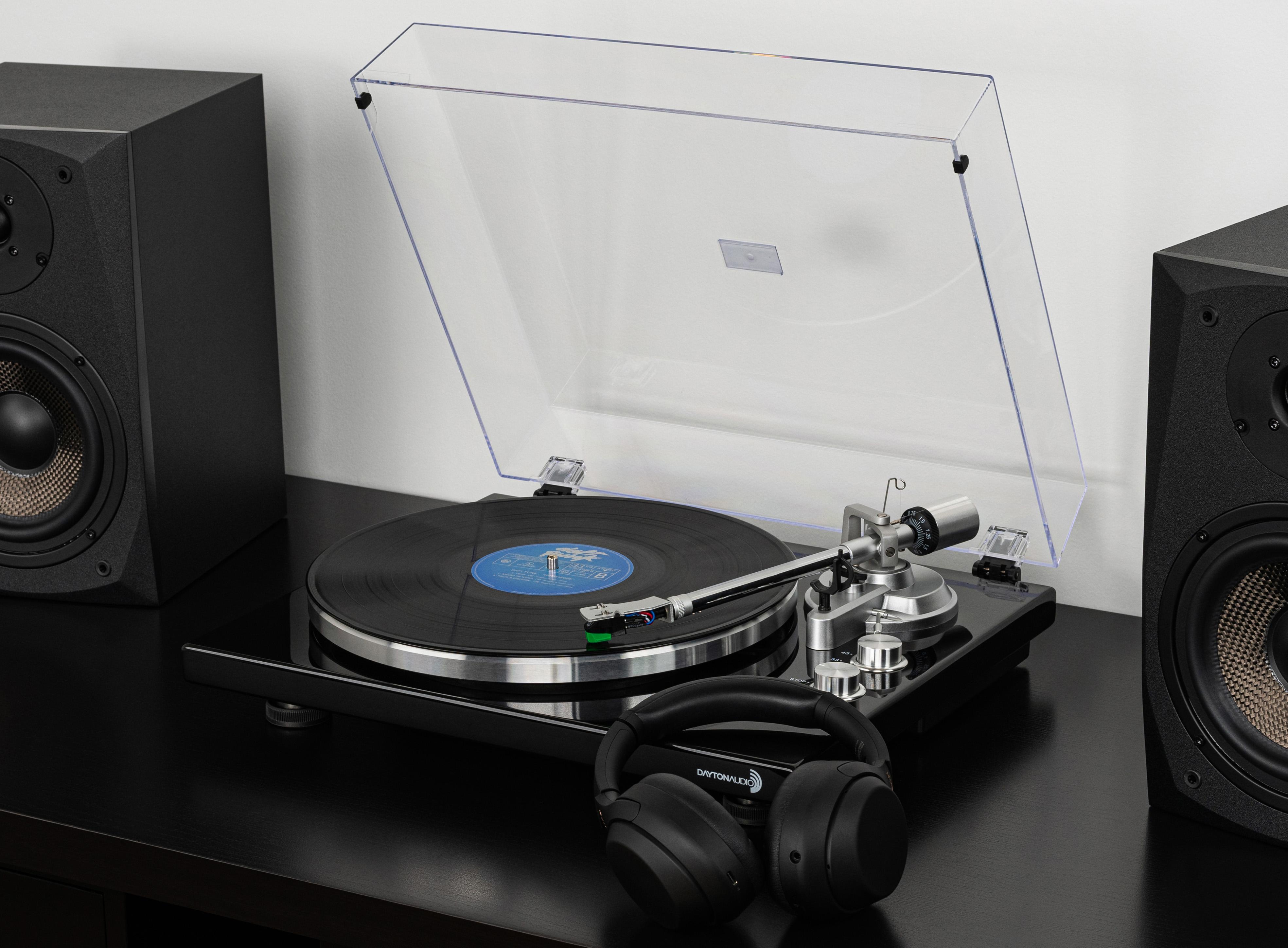 Dayton Audio Turntable Lifestyle Image with Bookshelf Speakers and Bluetooth Headphones